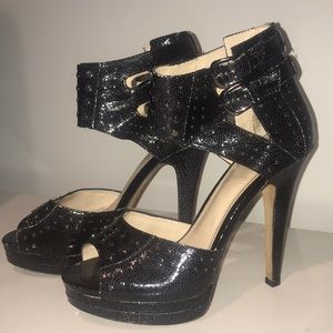 Black, strappy heels in an 8.5! Worn 3 times!